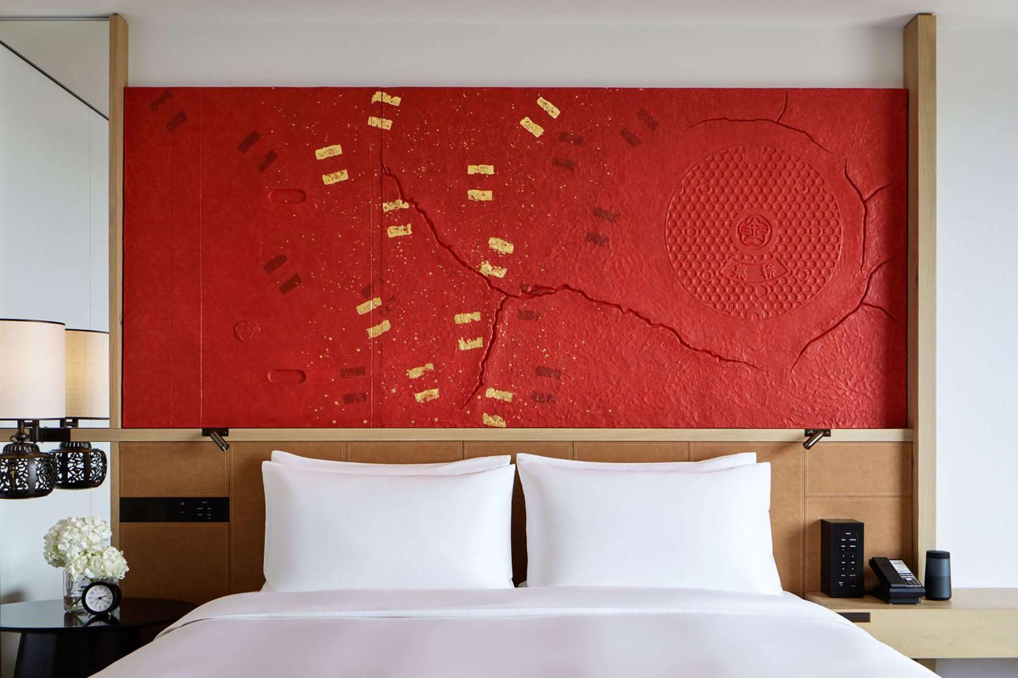 Hyatt Centric Kanazawa Exteriör bild A bed with a headboard